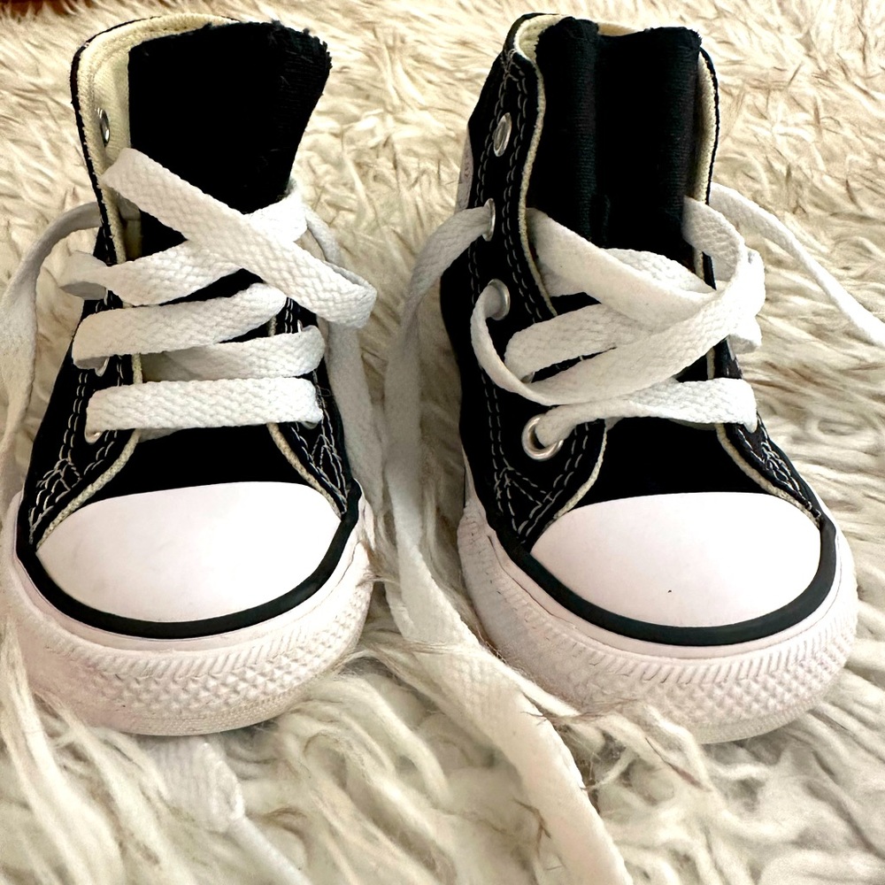 Black high top toddler Converse shoes
